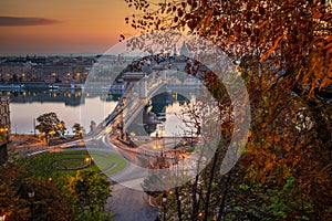 Budapest, Hungary - The famous Szechenyi Chain Bridge Lanchid and Clark Adam Square roundabout at sunrise