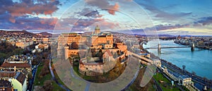 Budapest, Hungary - Golden sunrise at Buda Castle Royal Palace with Szechenyi Chain Bridge, Parliament