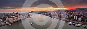 Budapest, Hungary - The Hungarian Parliament building on a large aerial panoramic photo with beautiful colorful winter sunset