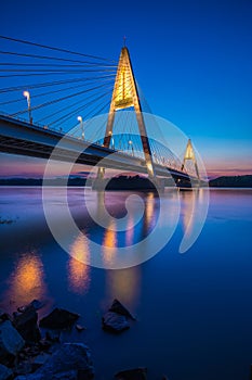Budapest, Hungary - The illuminated Megyeri Bridge over river Danube at blue hour
