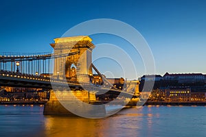 Budapest, Hungary - Illuminated Szechenyi Chain Bridge over River Danube and Buda Castle Royal Palace