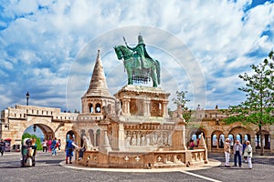 BUDAPEST, HUNGARY-MAY 03, 2016: View on the Old Fisherman Bastion in Budapest. Statue Saint Istvan and people near. Hungary.