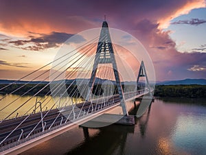 Budapest, Hungary - Megyeri Bridge over River Danube at sunset with beautiful dramatic clouds