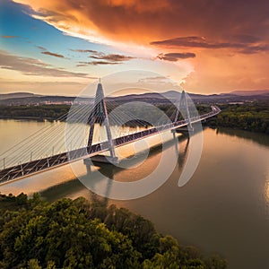 Budapest, Hungary - Megyeri Bridge over River Danube at sunset with beautiful dramatic clouds