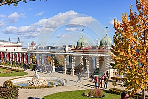 Budapest, Hungary - October 2021: Castle Garden Bazaar Varkert Bazar at Royal palace of Buda in autumn with Hungarian parliament