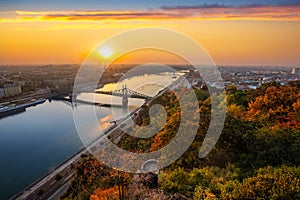 Budapest, Hungary - Panoramic skyline view of Budapest with beautiful autumn foliage, Liberty Bridge Szabadsag Hid and lookout photo