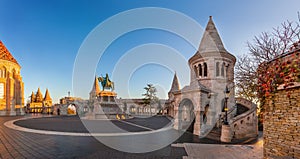 Budapest, Hungary - Panoramic view of the Fisherman`s Bastion Halaszbastya at sunrise with autumn foliage