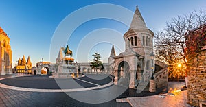 Budapest, Hungary - Panoramic view of the Fisherman`s Bastion Halaszbastya at sunrise with autumn foliage