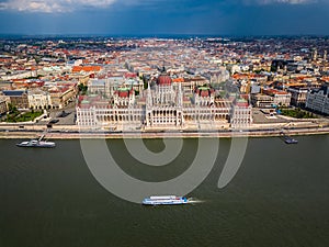 Budapest, Hungary - Sightseeing boat on River Danube with the Houses of Parliament building and skyline of Budapest