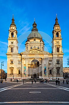 Budapest, Hungary - Warm colors on St. Stephens Basilica Szent Istvan Bazilika at sunset with clear blue sky