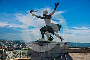 BUDAPEST, HUNGARY: Wide angle view of the Liberty Statue or Freedom Statue stands on Gellert Hill