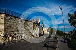 BUDAPEST, HUNGARY: Wide angle view of the Liberty Statue or Freedom Statue stands on Gellert Hill