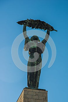 BUDAPEST, HUNGARY: Wide angle view of the Liberty Statue or Freedom Statue stands on Gellert Hill