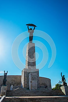 BUDAPEST, HUNGARY: Wide angle view of the Liberty Statue or Freedom Statue stands on Gellert Hill