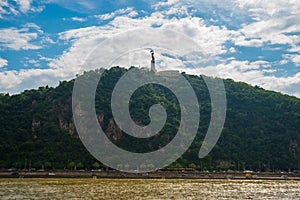 BUDAPEST, HUNGARY: Wide angle view of the Liberty Statue or Freedom Statue stands on Gellert Hill