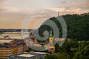 BUDAPEST, HUNGARY: Wide angle view of the Liberty Statue or Freedom Statue stands on Gellert Hill