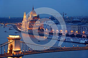 Budapest at night - The famous Chain Bridge across the Danube and the Hungarian Parliament seen from Gellert hill.