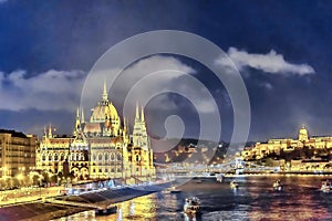 Budapest parliament building in the distance in Hungary at night time