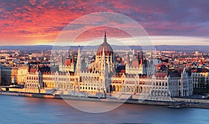 Budapest parliament at dramatic sunrise photo