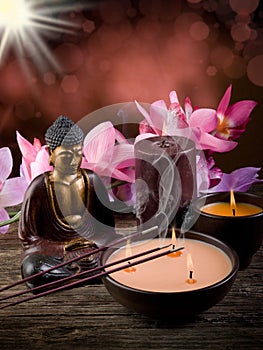 Buddah with candle and incense