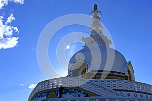 Buddas of Shanti Stupa a Buddhist white-domed stupa chorten on a hilltop in Chanspa, Leh district, Ladakh,