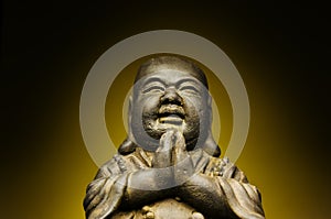 Buddha against yellow background