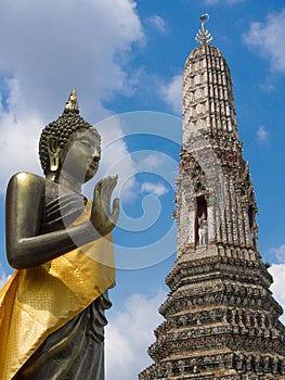 buddha on the attitude of persuading his relatives not to quarrel int The Temple of Dawn Wat Arun Bangkok, Thailand photo