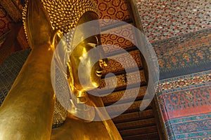 Buddha,The big golden reclining buddha Wat Phra Chetuphon locally known as Wat Pho