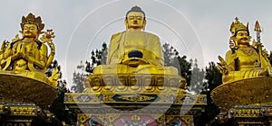 Buddha and bodhisattva gold statues Nepal buddhist temple Kathmandu