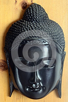 Buddha or Bouddha wooden mask photo