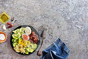 Buddha bowl, balanced food, vegetarian menu. Eggs, avocado, salad lettuce, bulgur, spice