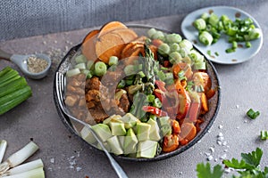 Buddha bowl with healthy vegetables served on plate