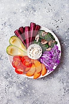 Buddha bowl with roasted vegetables. Healthy vegetarian appetizer or snack platter.