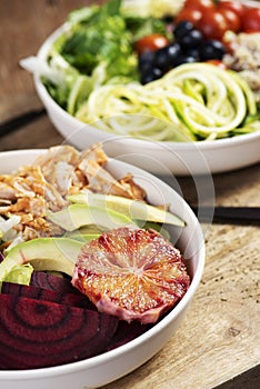 Buddha bowl salads on a wooden table