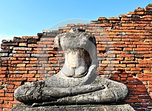 Buddha and bricks wall at wat Chai Wattanaram