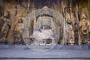 The Buddha Buddha of Fengxian Temple in Longmen Grottoes, Luoyang, China, and his four great disciples
