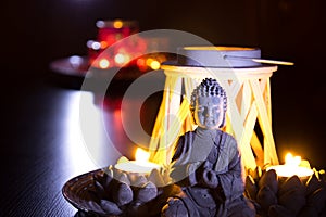Buddha with candles