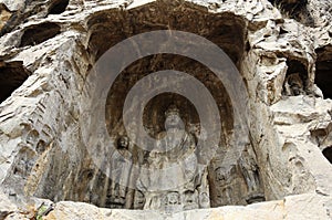 A Buddha carved in a cave of rocks