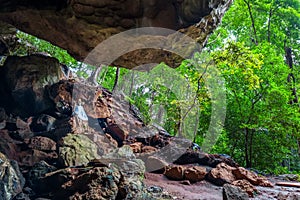 Buddha in cave, Wat Suwan Kuha temple, Thailand