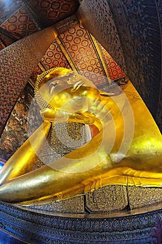 The buddha in the church watt pho in bangkok city thailand golden buddha statue photo