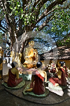 Buddha and disciples statues. Taung Kalat buddhist monastery. Mount Popa. Mandalay region. Myanmar