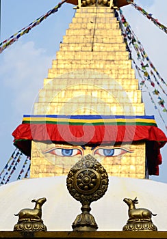 Buddha eyes of Bodhnath stupa and wheel of Dharma with two deers,Kathmandu,Nepal