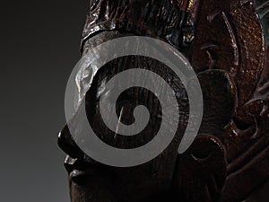 Buddha face profile low key