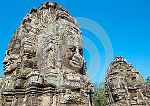 Buddha faces on towers in Bayon temple in Cambodia