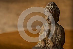 Buddha figure in prayer position