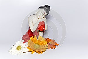 Buddha with flowers