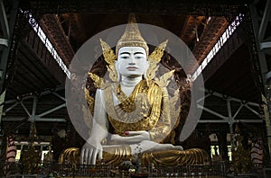 Buddha in gold, royal clothes,Ngar Htat Gyee pagoda,Yangon, Myanmar(Burma) photo