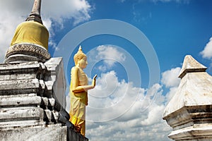 Buddha gold statue at Wat Khao Chedi-Phra Yai temple located on top of hill, Pathio, Chumphon district, Thailand