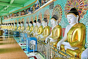 Buddha Golden images statues row inside U Min Thonze pagoda is famous tourist attraction located in Sagaing, Myanmar.