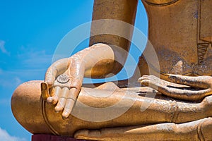 Buddha hand stucco on blue sky backgrond